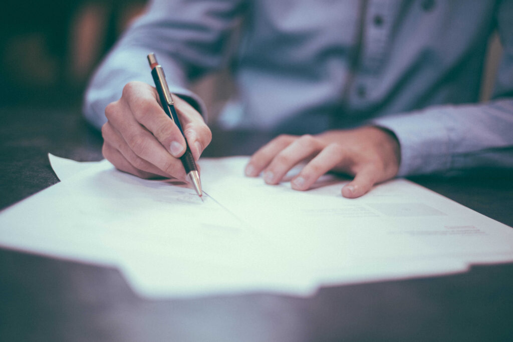 A divorce lawyer in Fitzrovia makes notes