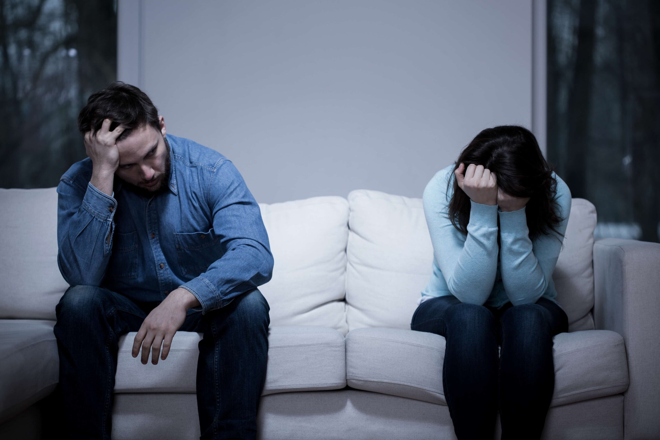 A sad couple who need a legal 500 family law solicitor